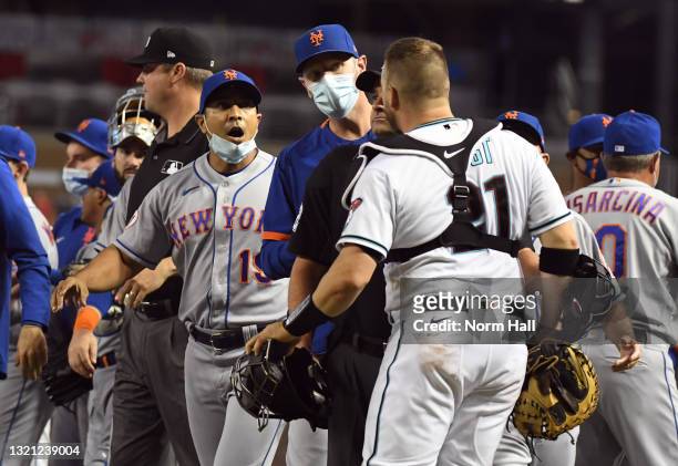 Stephen Vogt of the Arizona Diamondbacks argues with manager Luis Rojas of the New York Mets during the sixth inning at Chase Field on June 01, 2021...