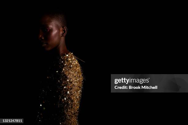 Model poses backstage ahead of the Yousef Akbar show during Afterpay Australian Fashion Week 2021 Resort '22 Collections at Carriageworks on June 02,...