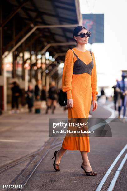 Katya Komarova wearing Dress and top Zara, Katya Komarova bag, Bottega Veneta shoes and Celine sunglasses at Afterpay Australian Fashion Week 2021 on...