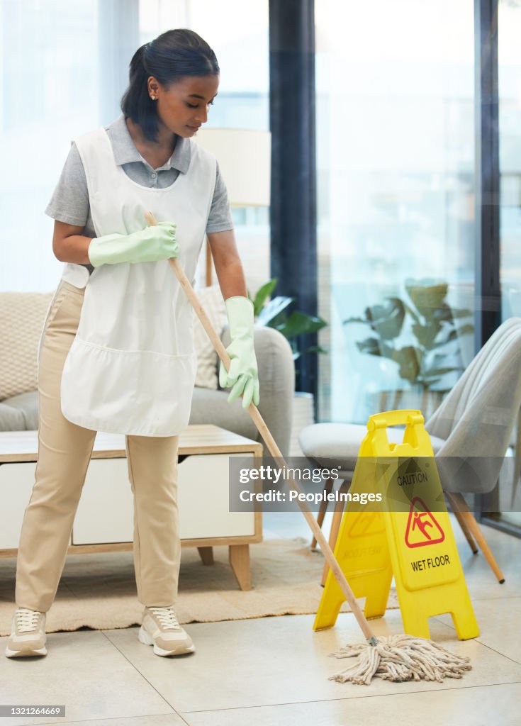 Woman Moping Shot Of A Young Woman Mopping The Floor High-Res Stock Photo - Getty Images