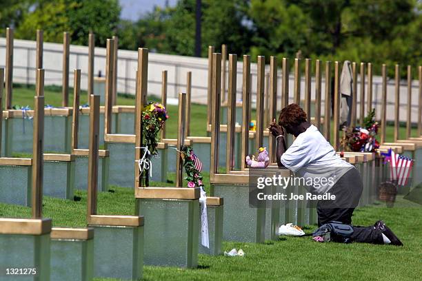 Ellajean Thompson mourns at the chair that represents her aunt Laura Jane Garrison, June 11, 2001 at the Oklahoma National Memorial in Oklahoma City,...