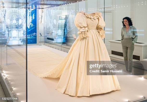 The wedding dress of Diana, Princess of Wales is displayed during the "Royal Style In The Making" exhibition photocall at Kensington Palace on June...