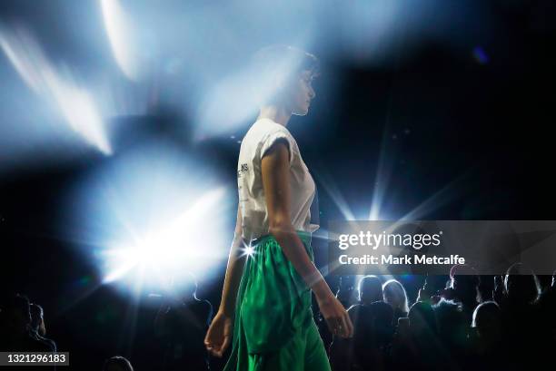 Model walks the runway during the KITX show during Afterpay Australian Fashion Week 2021 Resort '22 Collections at Carriageworks on June 02, 2021 in...