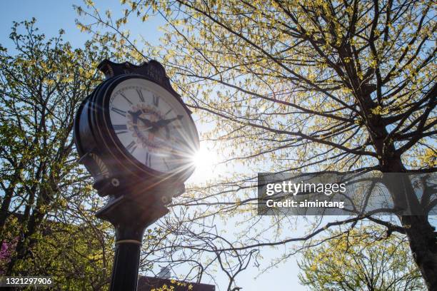 historic clock in downtown doylestown - doylestown pa stock pictures, royalty-free photos & images