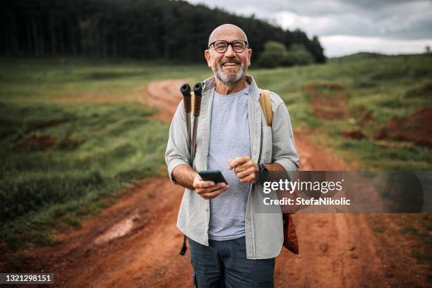 it's time to go up - man backpack stock pictures, royalty-free photos & images