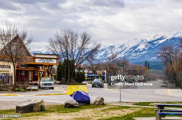 main street in golden, british columbia - golden british columbia stock pictures, royalty-free photos & images