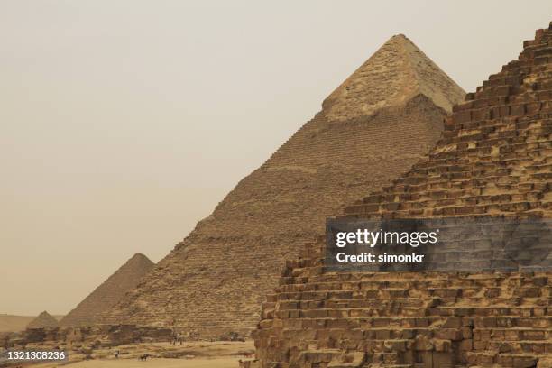 view of the giza pyramid complex at giza - pyramid of chephren stock pictures, royalty-free photos & images