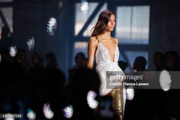 Model walks the runway during the Yousef Akbar show during Afterpay Australian Fashion Week 2021 Resort '22 Collections at Carriageworks on June 02,...