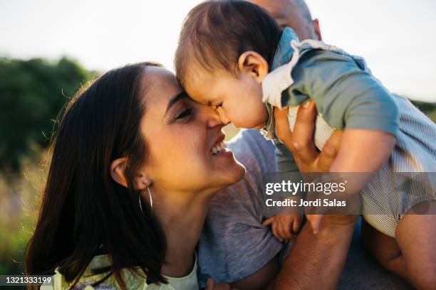 family playing with their son on the countryside - spanskt och portugisiskt ursprung bildbanksfoton och bilder