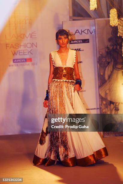 Model walks the ramp for designer Rohit Bal creation at the Lakme Fashion Week Winter/Festive 2011 on August 16, 2011 in Mumbai,India