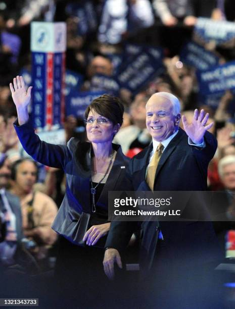 Republican Presidential candidate John McCain and Vice Presidential candidate Sarah Palin wave to delegates at the close of the Republican National...