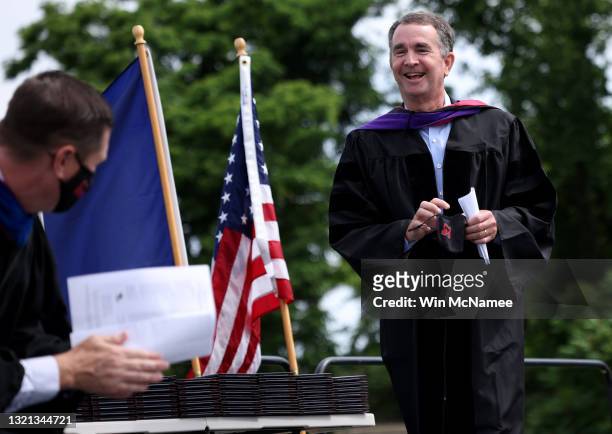Virginia Governor Ralph Northam concludes his remarks at George Mason High School's graduation ceremony June 2, 2021 in Falls Church, Virginia. Today...