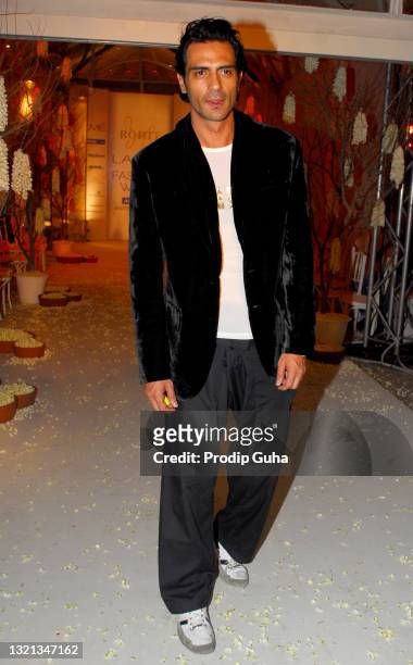 Arjun Rampal attends the designer Rohit Bal show at the Lakme Fashion Week Winter/Festive 2011 on August 16, 2011 in Mumbai,India