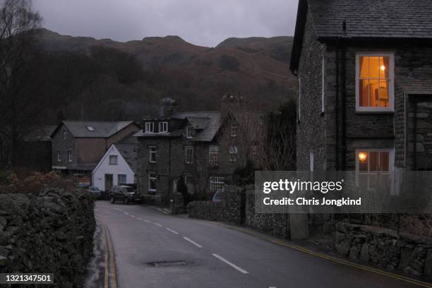 stone houses on quiet residential street in the mountains - english village stock pictures, royalty-free photos & images