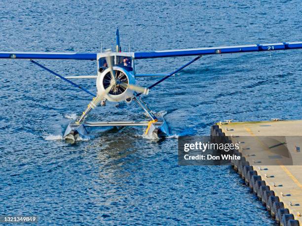 vancouver skyline on the coast of british columbia - seaplane stock pictures, royalty-free photos & images