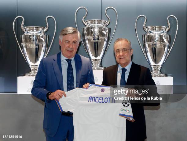 New Real Madrid Head Coach Carlo Ancelotti poses with the club's President Florentino Pérez during his official presentation on June 02, 2021 in...