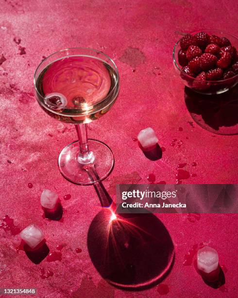 raspberry prosecco - raspberry cocktail stock pictures, royalty-free photos & images