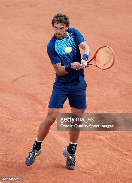 Henri Laaksonen of Switzerland plays a backhand shot in his Second Round match against Roberto Bautista of Spain during day four of the 2021 French...