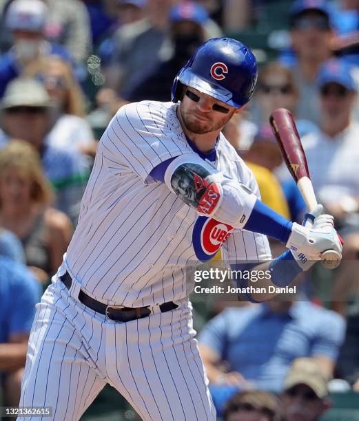 Ian Happ of the Chicago Cubs wears an elbow guard honoring the first Lou Gehrig Day for ALS awareness during a game against the San Diego Padres at...