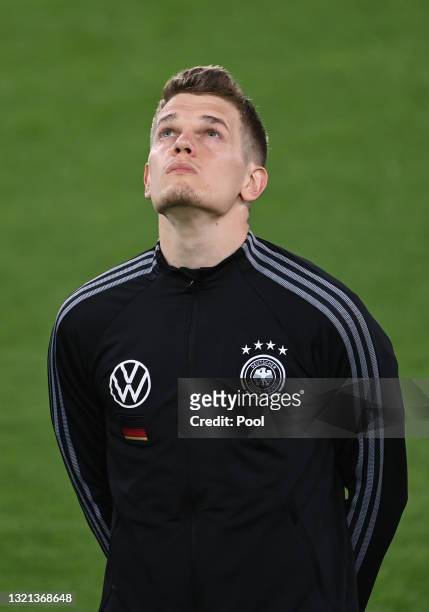 Matthias Ginter of Germany looks on during the national anthem prior to the international friendly match between Germany and Denmark at Tivoli...