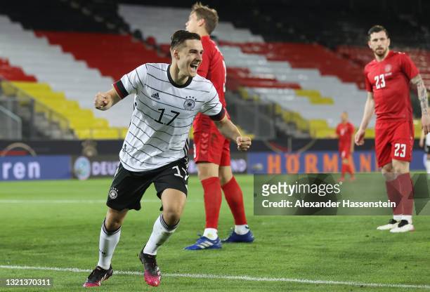 Florian Neuhaus of Germany celebrates after scoring their side's first goal during the international friendly match between Germany and Denmark at...
