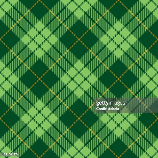 green and yellow argyle scottish tartan plaid textile pattern - kilt stock illustrations