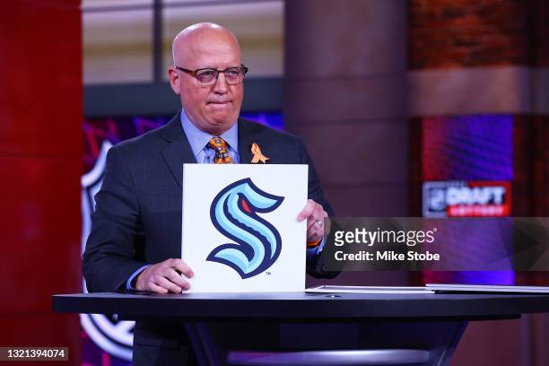 National Hockey League Deputy Commissioner Bill Daly announces the Seattle Kraken overall draft position during the 2021 NHL Draft Lottery on June...