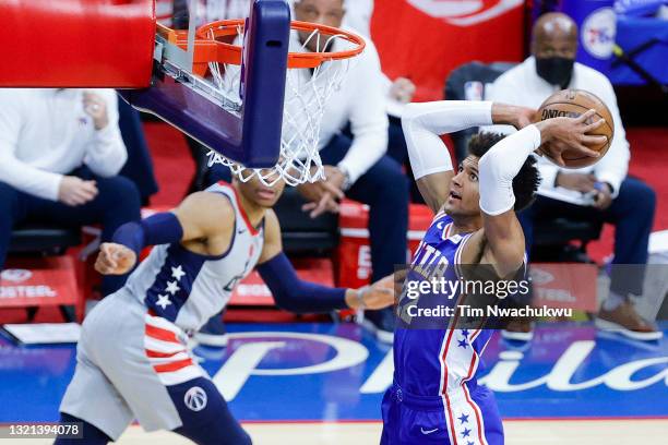 Matisse Thybulle of the Philadelphia 76ers elevates for a dunk during the first quarter against the Washington Wizards during Game Five of the...