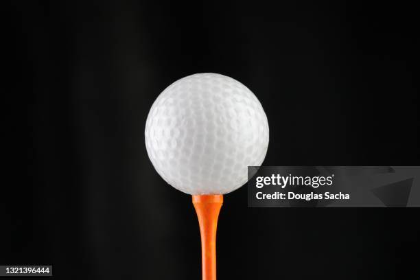 the golf ball is on the green - golf clubs stock pictures, royalty-free photos & images