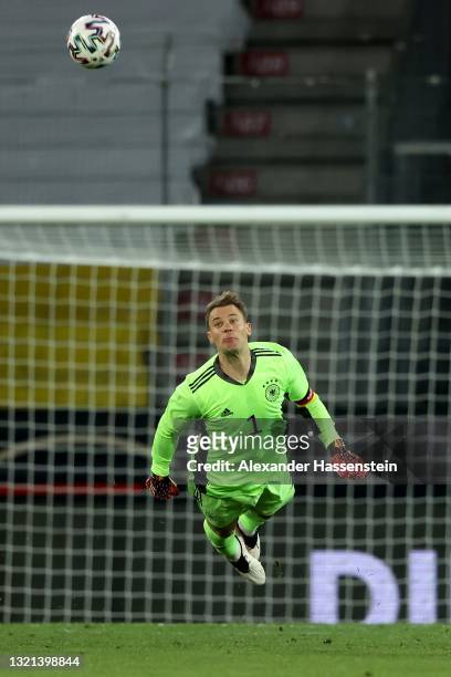 Manuel Neuer of Germany battles for the ball during the international friendly match between Germany and Denmark at Tivoli Stadion on June 02, 2021...