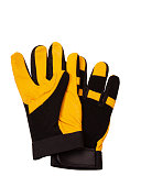 Yellow and black leather work gloves shot in studio on white background