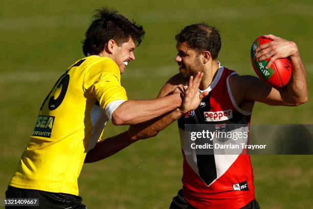 Sam Alabakis and Paddy Ryder of the Saints compete during a St Kilda Saints AFL training session at RSEA Park on June 03, 2021 in Melbourne,...