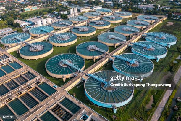 aerial view water treatment plant for environment conservation. - sewage stockfoto's en -beelden