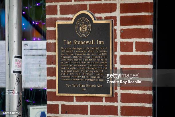 View of the Stonewall Inn commemorative sign on June 02, 2021 in New York City. The Stonewall Inn was the site of the 1969 Stonewall Riots which are...