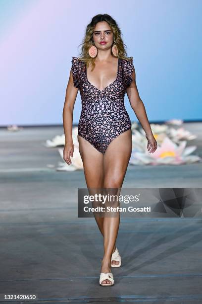 Model Samantha Harris walks the runway in a design by Indii Swimwear during the Indigenous Fashion Projects show during Afterpay Australian Fashion...