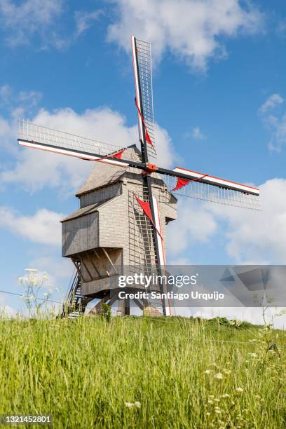 traditional wooden windmill - traditionally belgian stock pictures, royalty-free photos & images