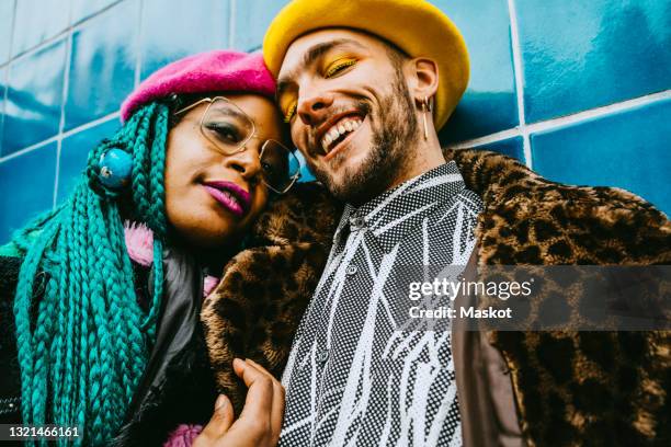 portrait of happy young man with mid adult woman - friends women makeup ストックフォトと画像