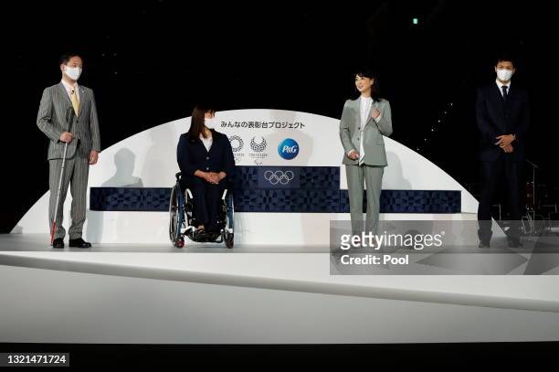 Olympians and Paralympians Junichi Kawai, Kuniko Obinata, Kyoko Iwasaki and Ryota Murata attend an unveiling event for the elements including podium,...