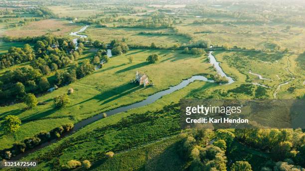 an aerial sunset view of the newark priory ruins, surrey - stock photo - surrey england stock pictures, royalty-free photos & images