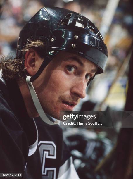 Wayne Gretzky, Captain and Center for the Los Angeles Kings looks on from the bench during the NHL Prince of Wales Conference, Adams Division game...