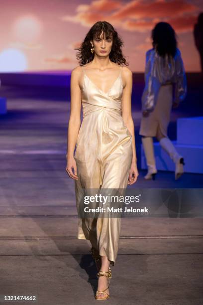 Model walks the runway during the Manning Cartell show during Afterpay Australian Fashion Week 2021 Resort '22 Collections at Carriageworks on June...