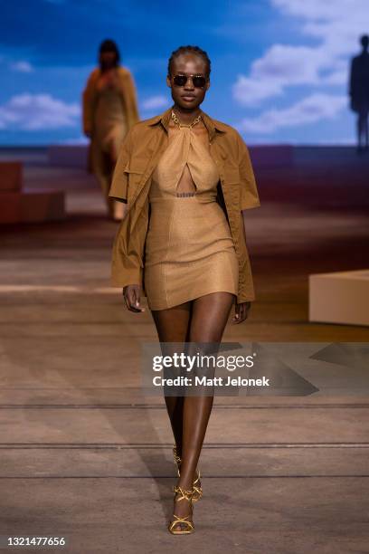 Model walks the runway during the Manning Cartell show during Afterpay Australian Fashion Week 2021 Resort '22 Collections at Carriageworks on June...