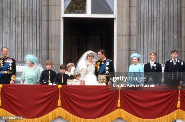 Prince Charles, Prince of Wales and Diana, Princess of Wales, wearing a wedding dress designed by David and Elizabeth Emanuel and the Spencer family...