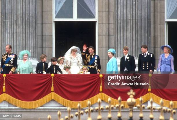 Prince Charles, Prince of Wales and Diana, Princess of Wales, wearing a wedding dress designed by David and Elizabeth Emanuel and the Spencer family...