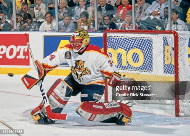 John Vanbiesbrouck, Goalkeeper for the Florida Panthers attempts to stop the puck during Game 4 of the NHL Stanley Cup Finals against the Colorado...