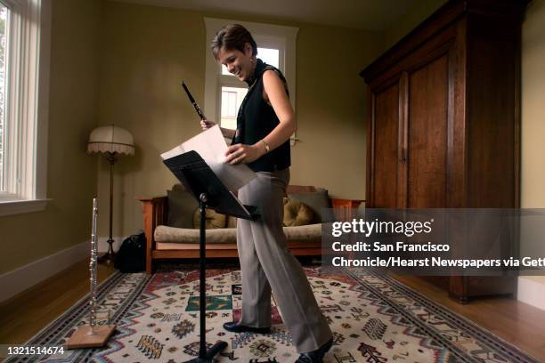 MTT_LH_027jpeg.JPG Cathy Payne, the SF Symhony's piccolo player, at home in advance of her first big solo turn. Shot in San Francisco on...