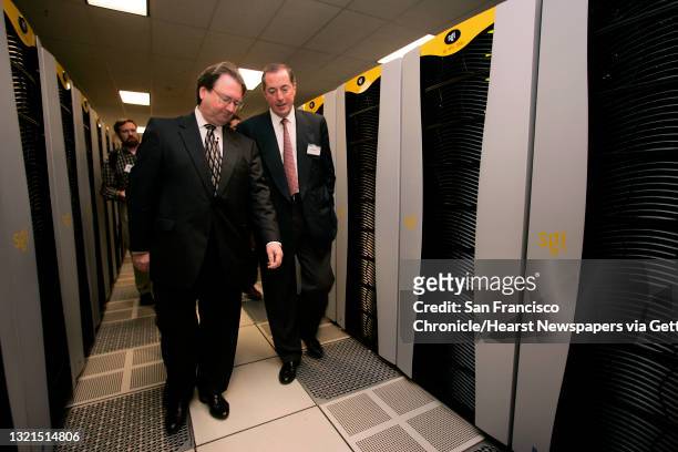 At left is G. Scott Hubbard, director of Nasa Ames research center, talking with Paul Otellini , president and chief operating officer of Intel, as...