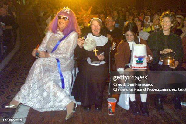 SOUND18e-C-16FEB01-DD-LH --left to right--Gilbert Baker, Phyllis Burke, Annette Gaudino, and Lynne Hendee attended the sing a long "Sound of Music"...