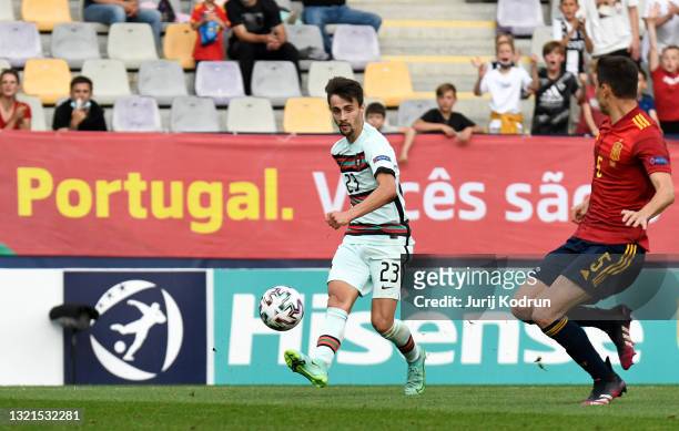 Fabio Vieira of Portugal scores their team's first goal during the 2021 UEFA European Under-21 Championship Semi-finals match between Spain and...