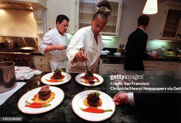 1a/C/26MAR99/FD/LH--Owner/chef Alice Wilson preparing the entree of Napolean of Filet Mignon with grilled red onion, portobello mushrooms, baby red...